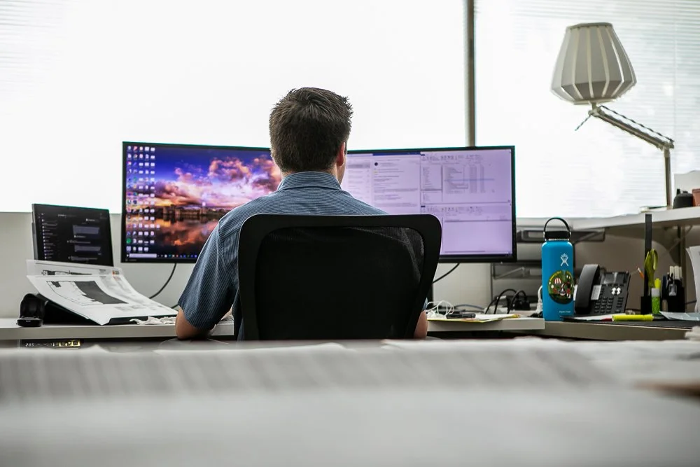 Environ employee working at computer