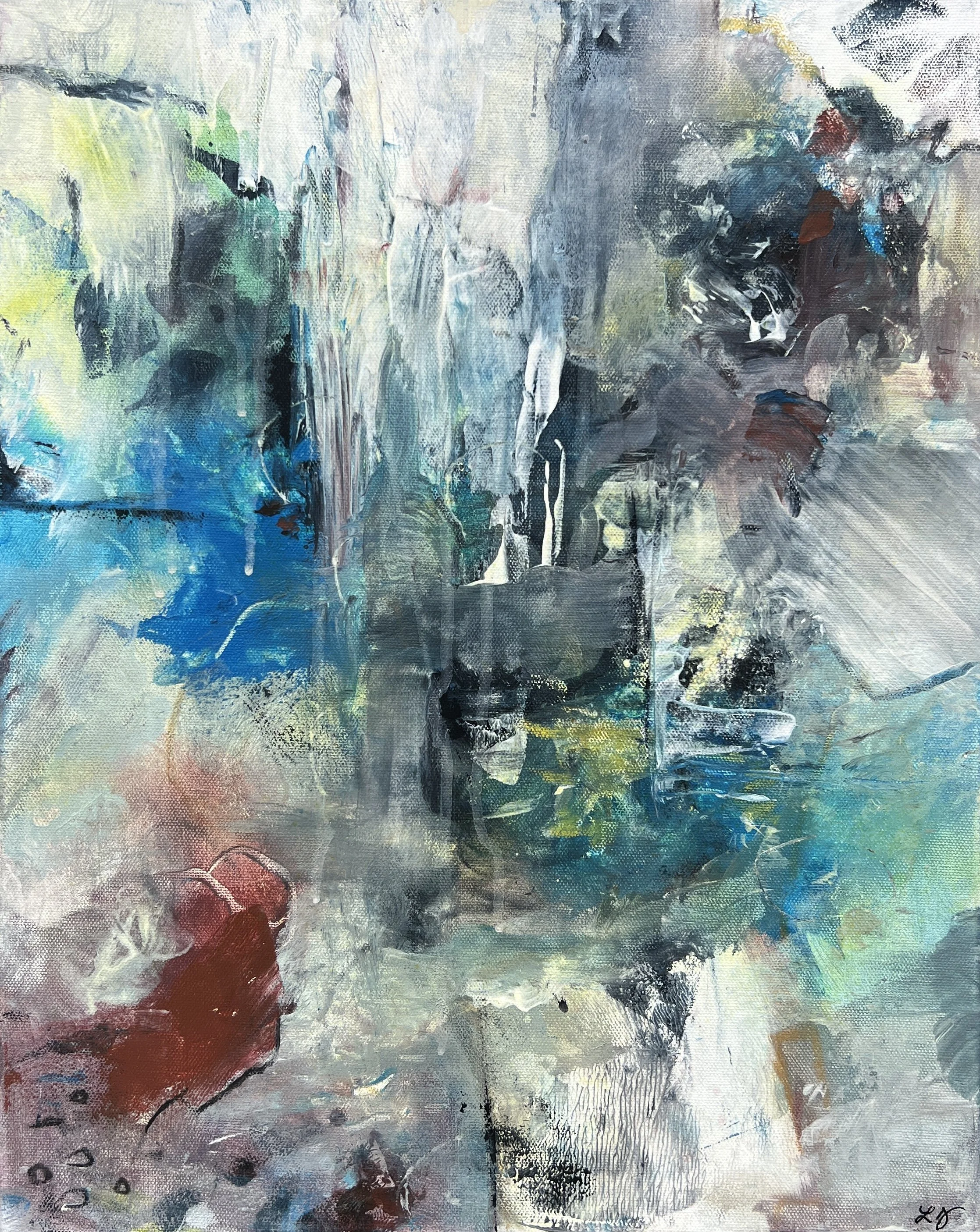 Abstract mixed media painting with layered blues, grays, whites, and red accents, framed in a black gallery frame.