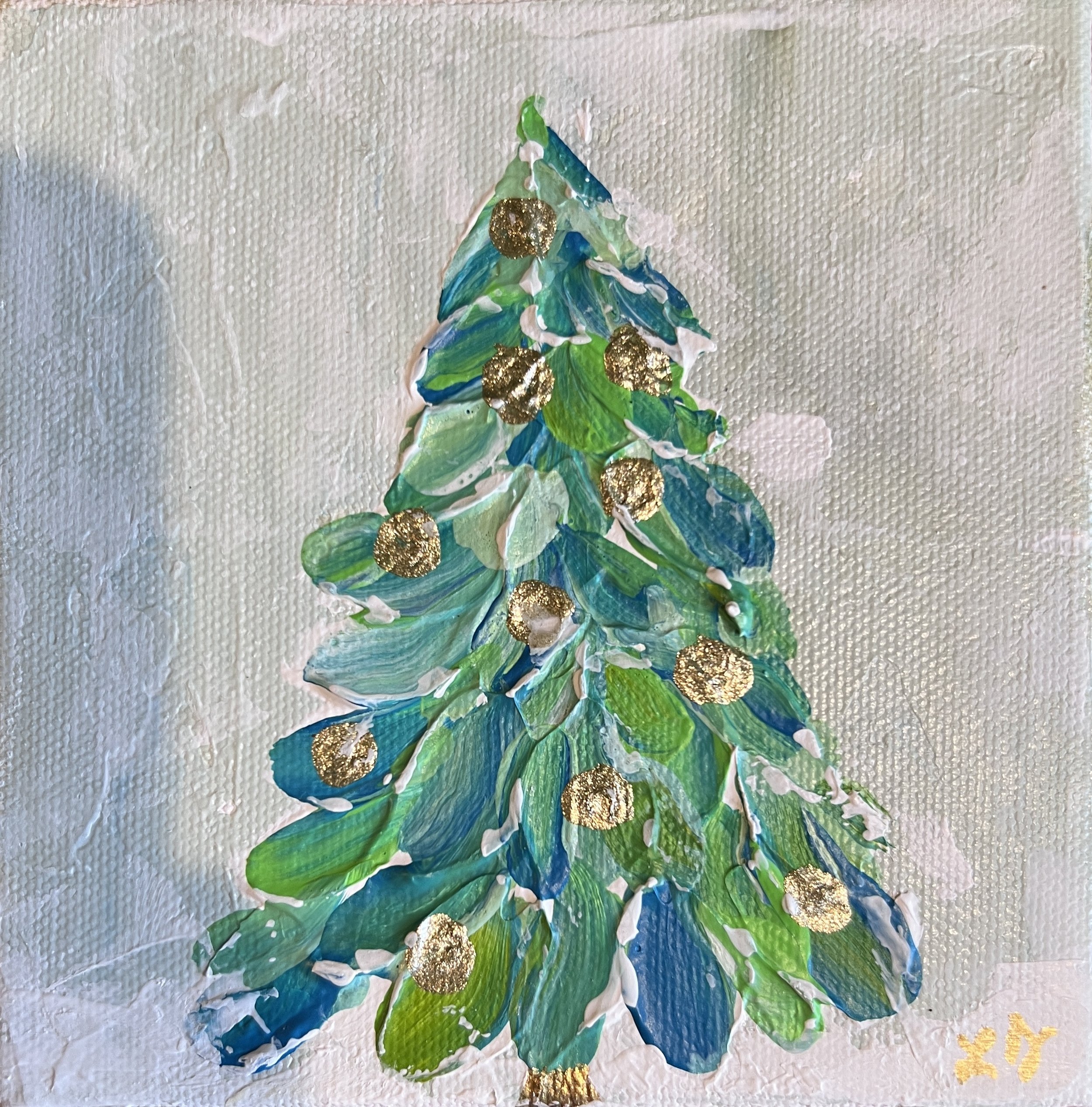 Small textured Christmas tree painting with teal and green strokes and gold accents on a 5×5 gallery-depth canvas.