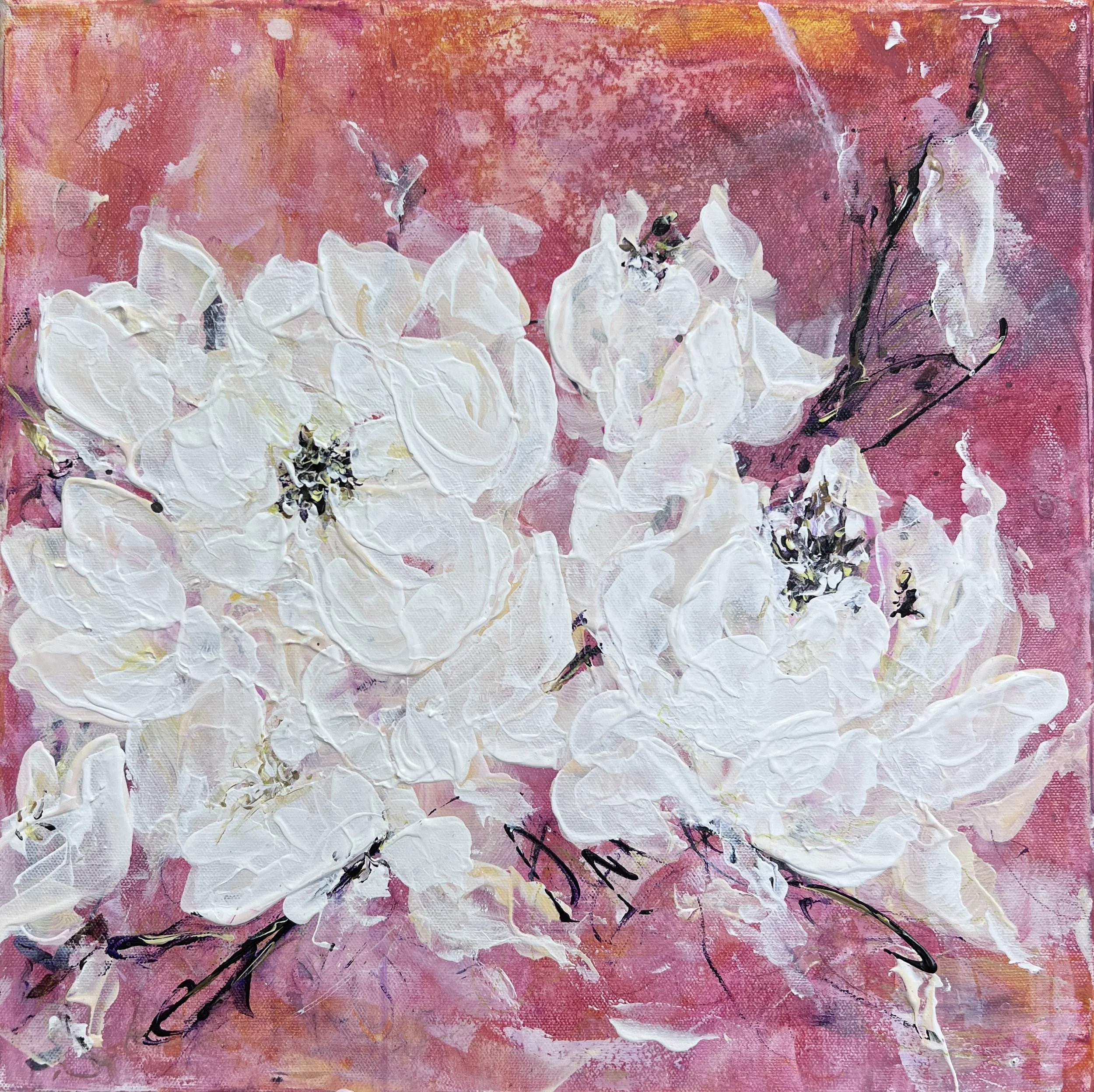 White magnolia blossoms painted in textured acrylic against a vibrant pink and coral background in a framed 16x16 canvas.