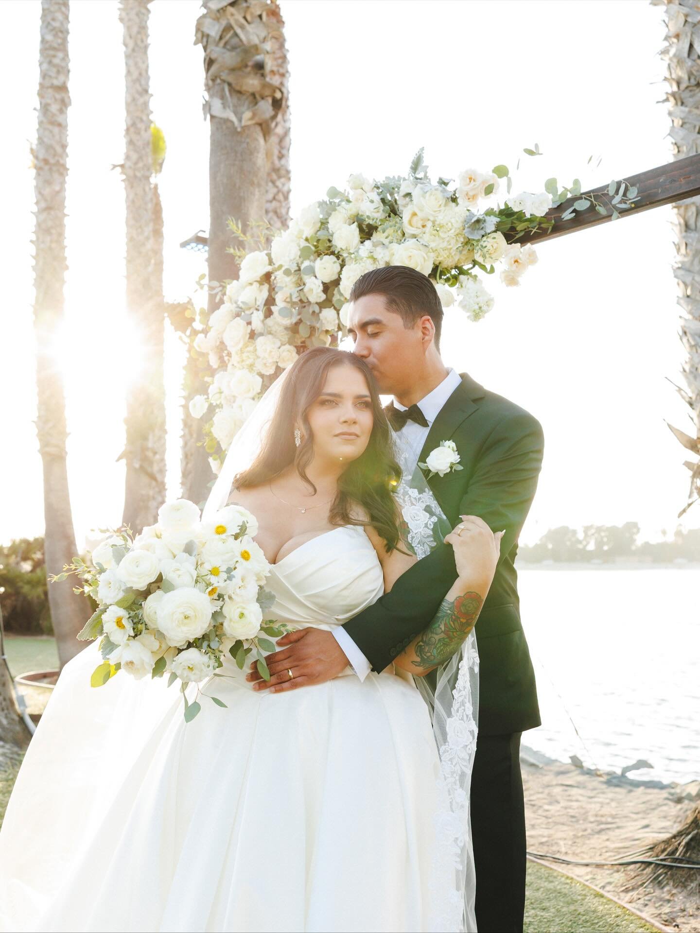 a beautiful beginning ✨🤍💍

Coordination | @gloweventcoordination 
Venue | @paradisepointsd @tidal_sd 
Photo &amp; Video | @zatonsky_moments 
Florist | @camelliaweddingflowers 
Cake | @violetcakecompany 
Officiant | @elementsofstylesd 
Makeup | @mak