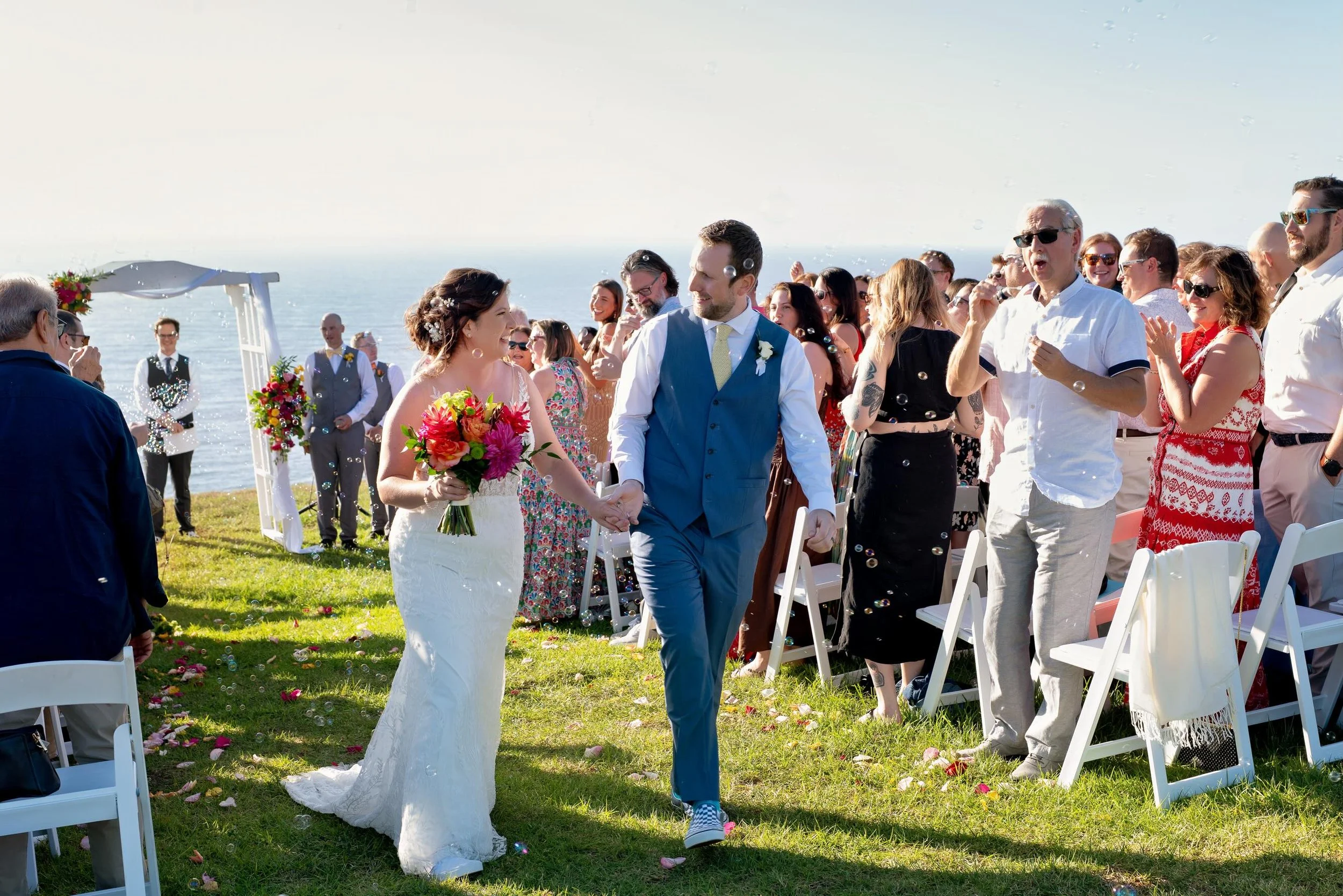 From ocean cliffs to aquarium views ✨🐚🩵

Ceremony | @flytorrey 
Reception | @birchaquarium 
DJ | @supremedjentertainment 
Photo &amp; Video | @timaulgerphotography 
Florals | @francosflowers 
Catering | @wildthymeco 
Bar | @frenchgourmet 
HMU | @sh