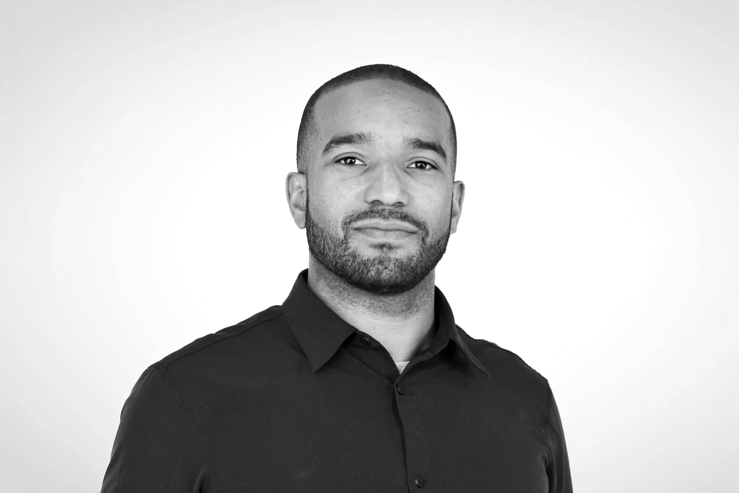 Black and white headshot of Garrett