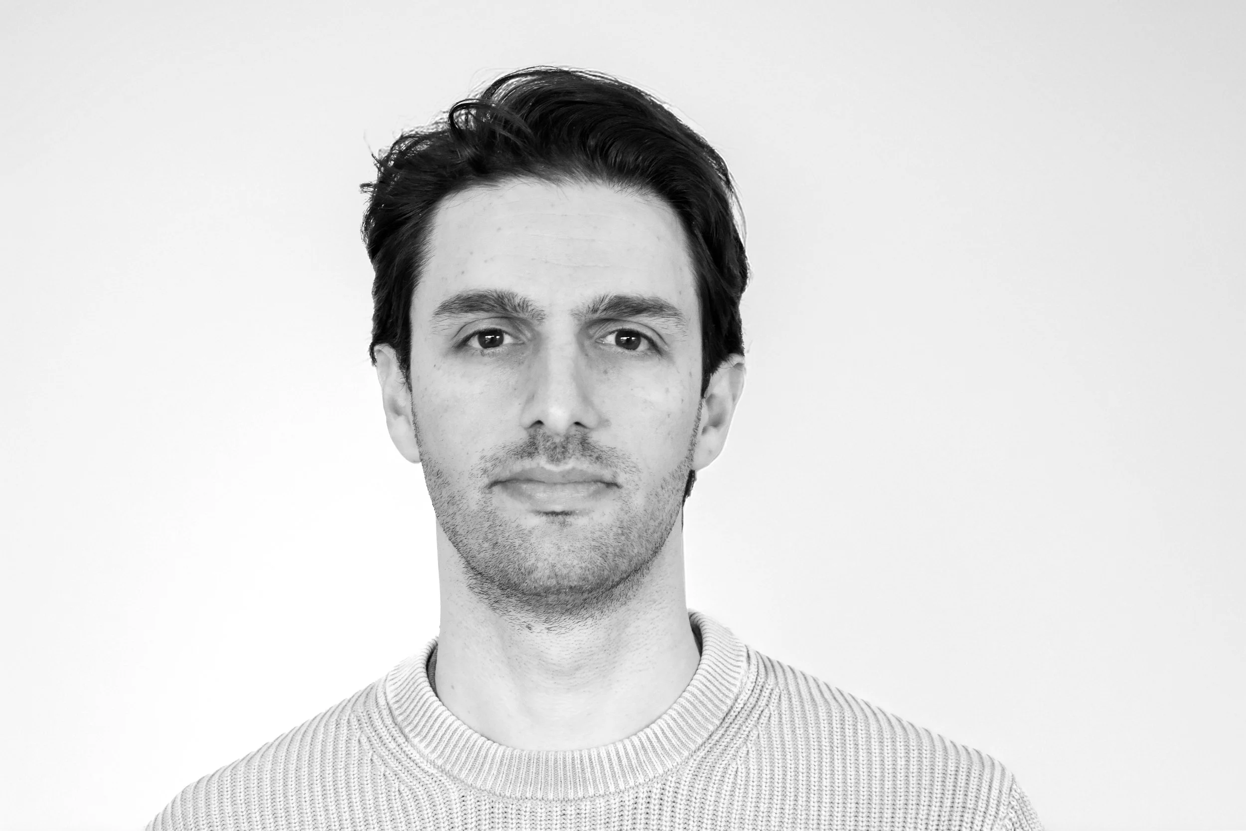 Black and white headshot of the Kelvin chief of staff