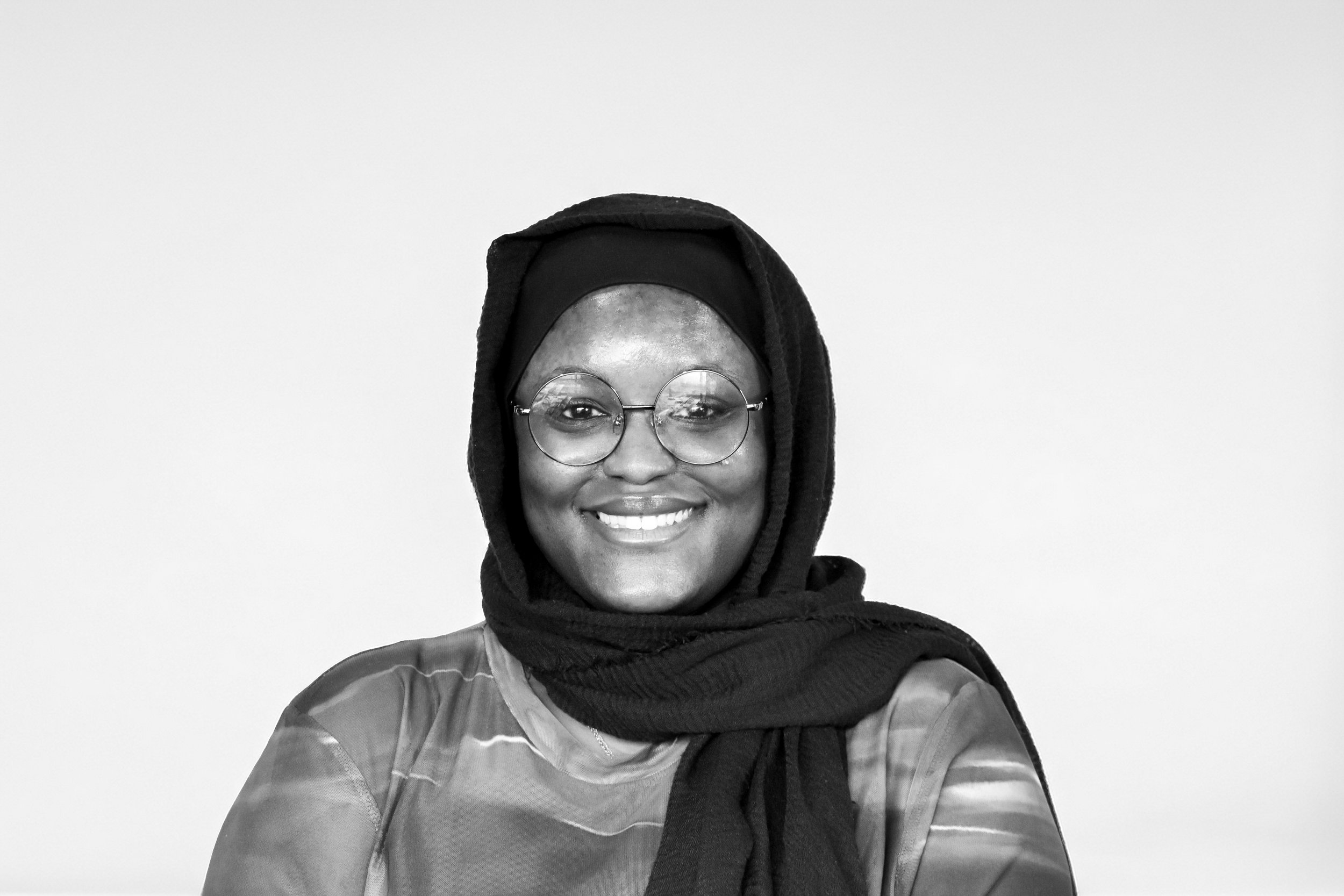 Black and white headshot of sales and marketing manager