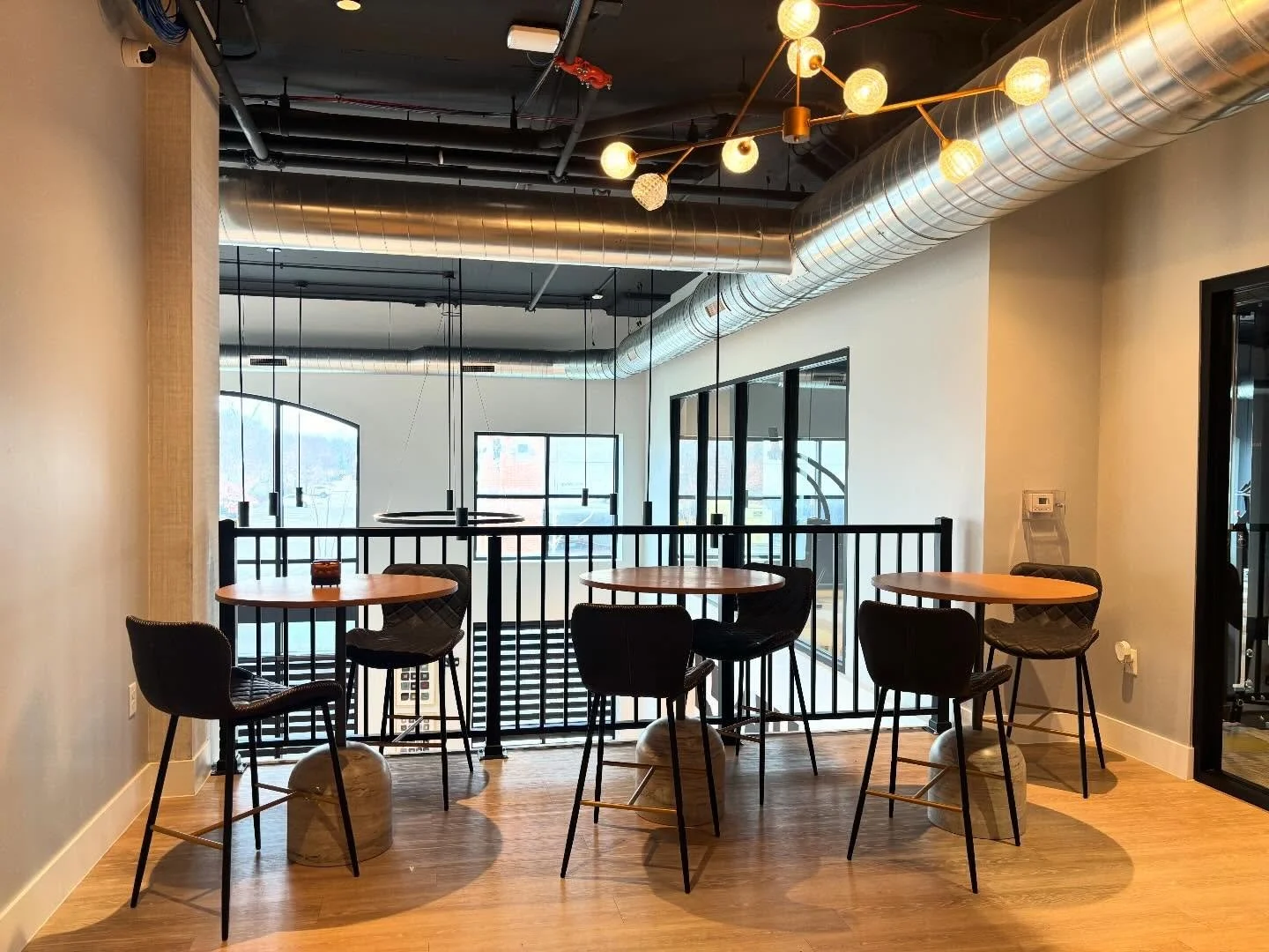 Quiet views, comfy seating, and plenty of space to unwind.
Our second-floor lounge features three tables overlooking the Social Room &mdash; the perfect spot to study, work, or take a break. ✨
#TheKingstonLiving #LoungeSpace #CommunityAmenities