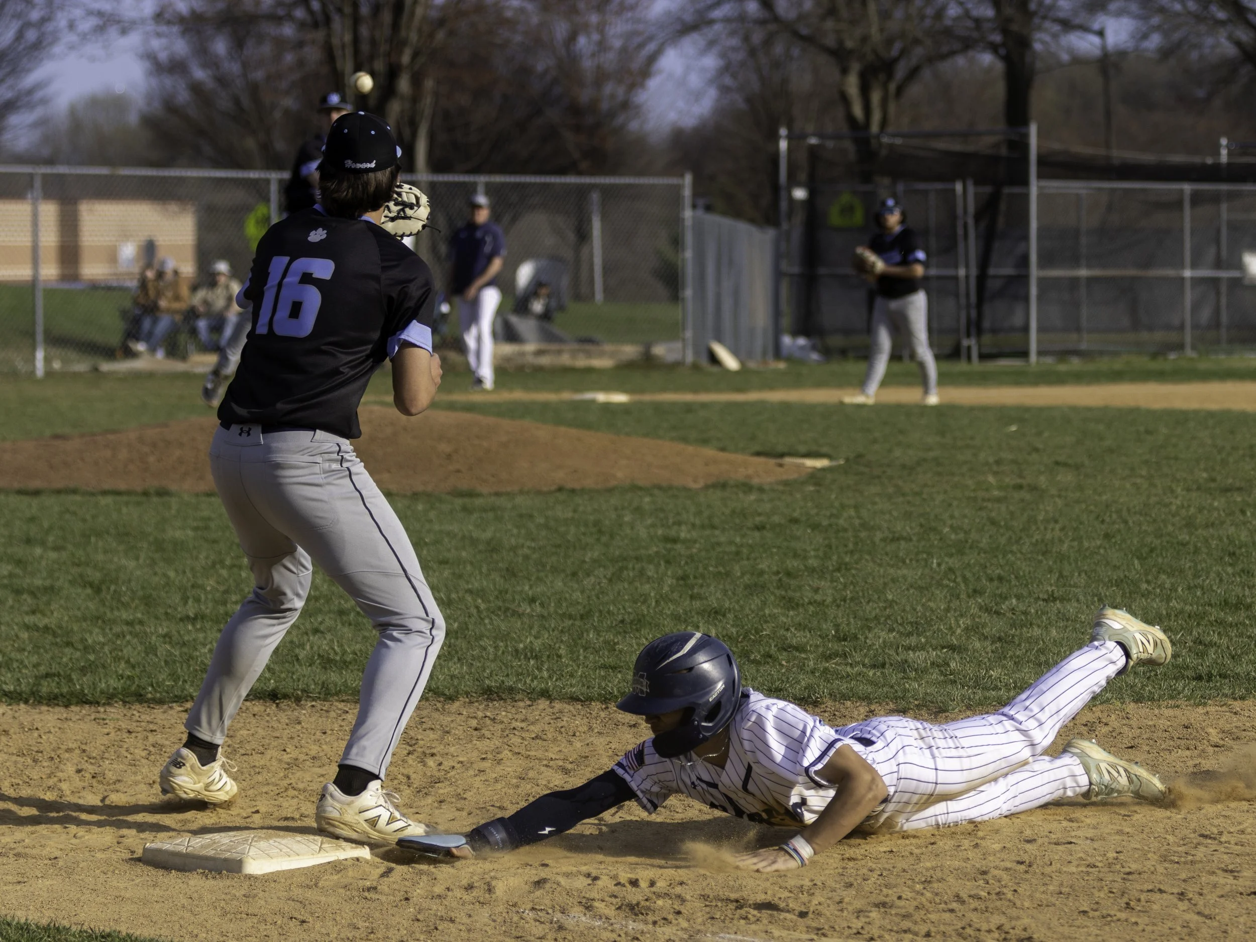 baseball game- 2026 howard vs marriots ridge high school- sliding into bases