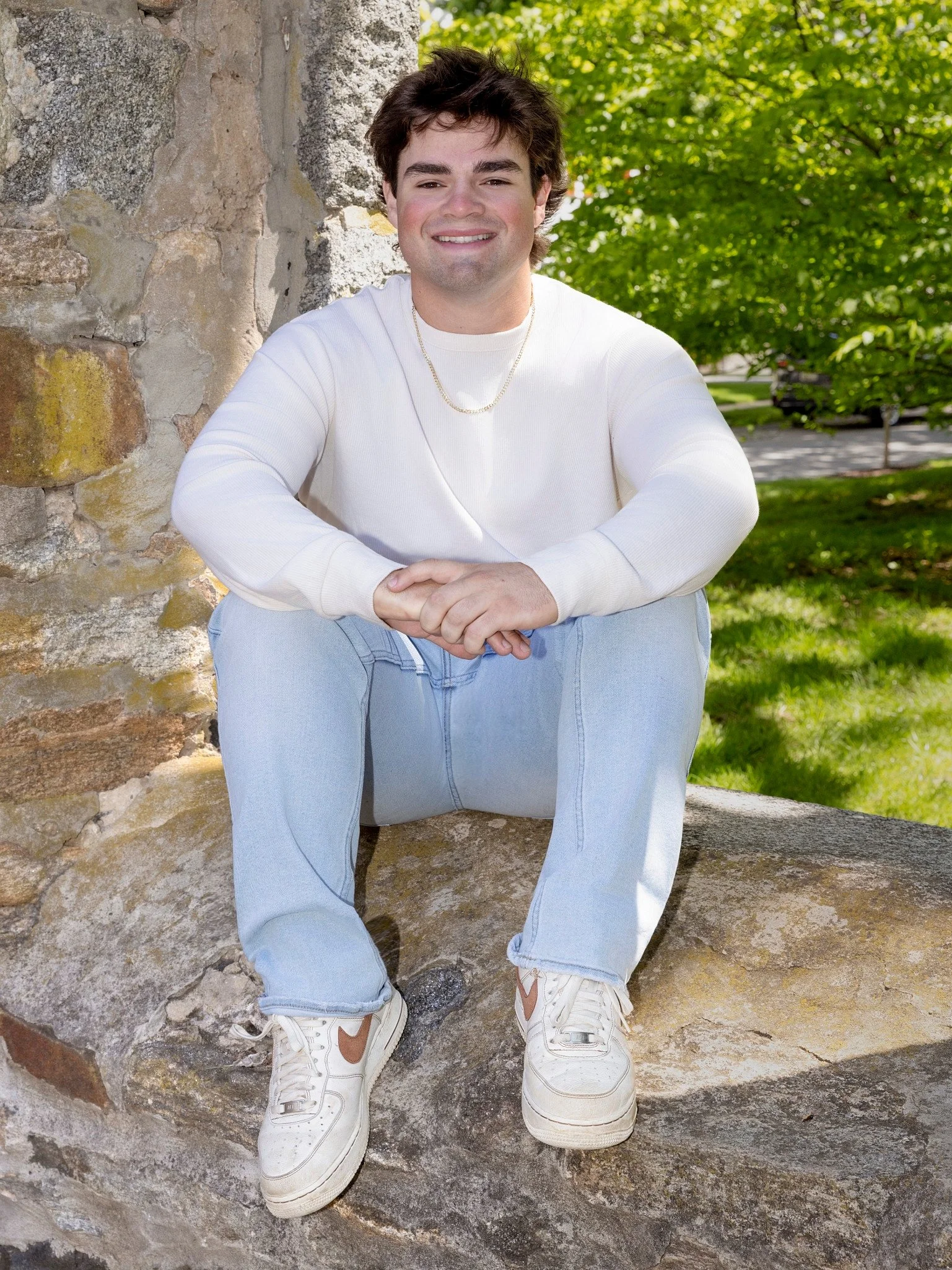 Senior Portrait- White tutle neck- gold chain- jeans- white nike shoes- outdoor photography-ruins