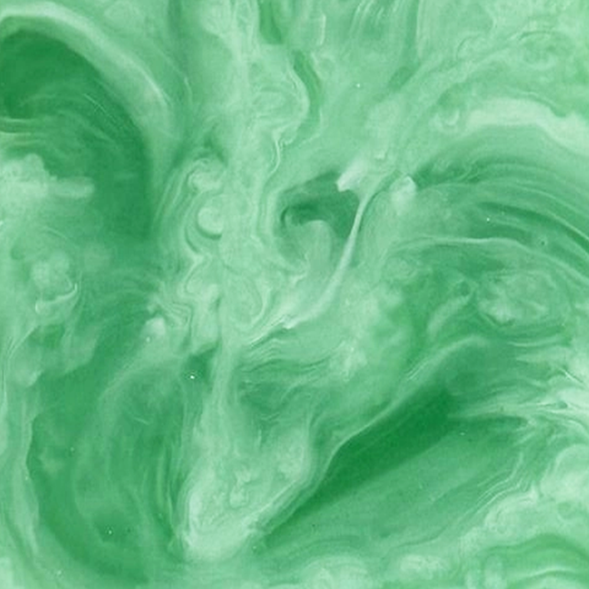 Close-up of green and white swirling marble pattern.