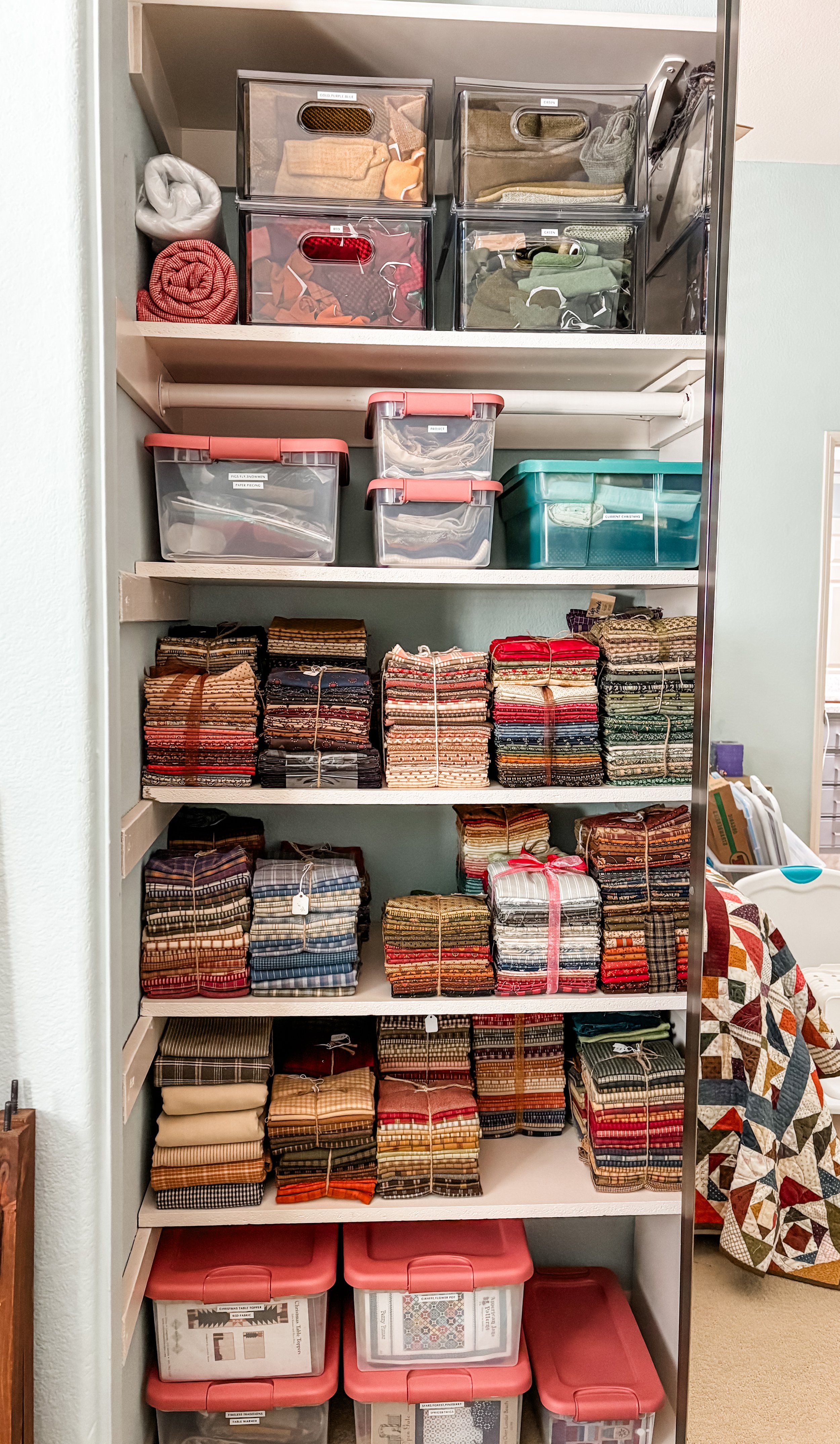 large closet with fabric organization