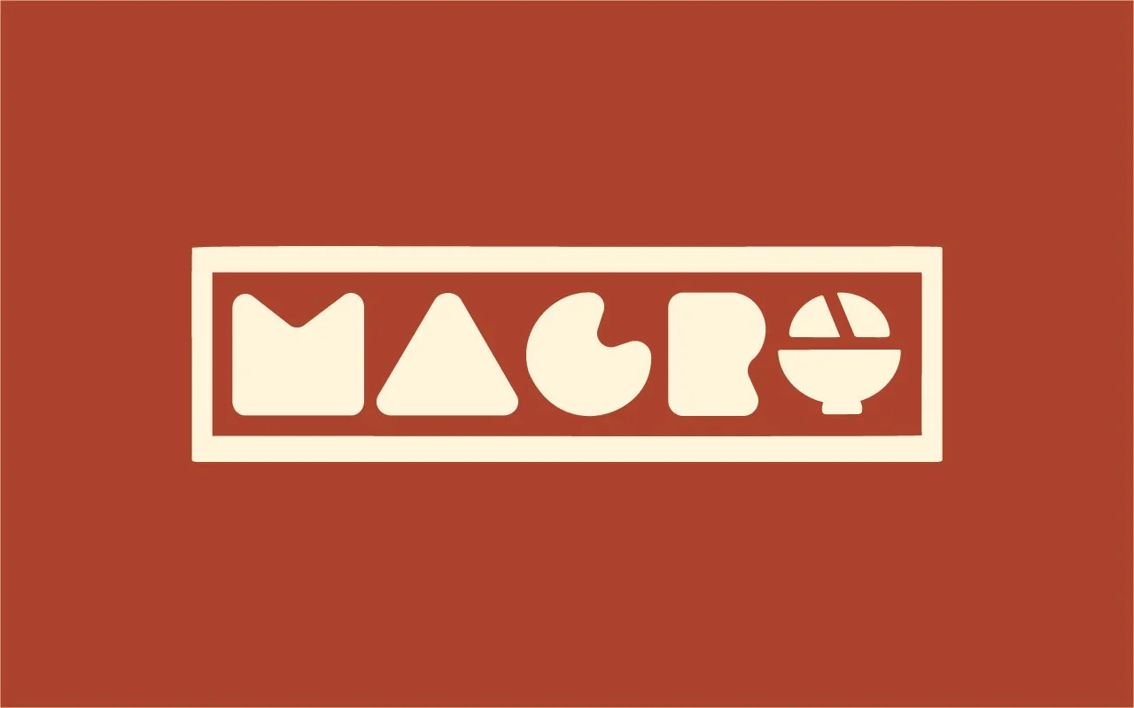 Stylized abstract shapes arranged in a row inside a rectangular border on a reddish-brown background.