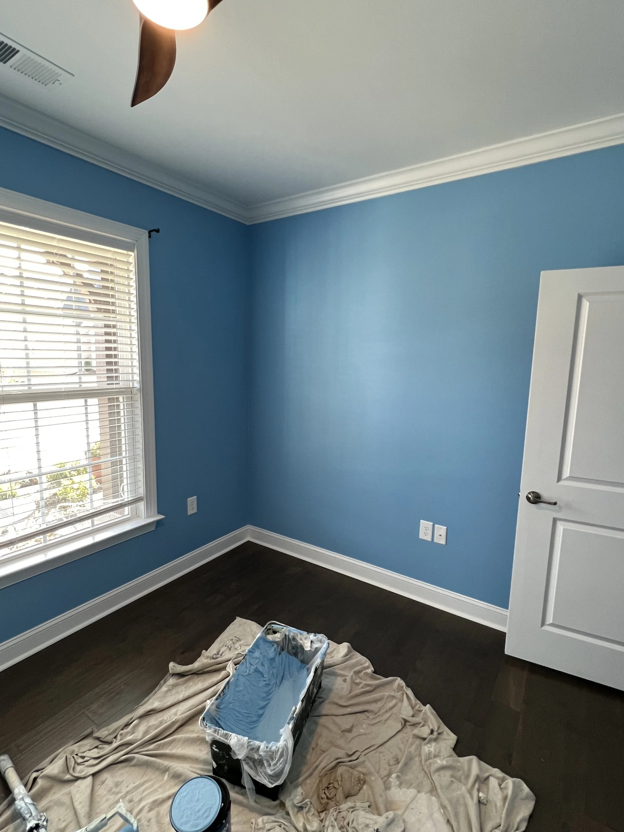 Meticulous surface preparation and property protection for a custom bedroom repaint