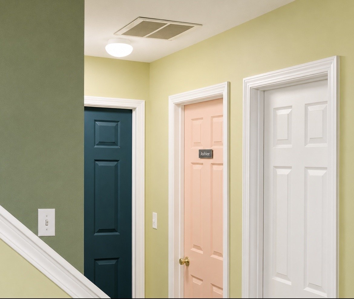 Hallway with three closed doors, one pink with a nameplate, one white, and one dark green, with white trim, on light yellow walls, and ceiling vent.