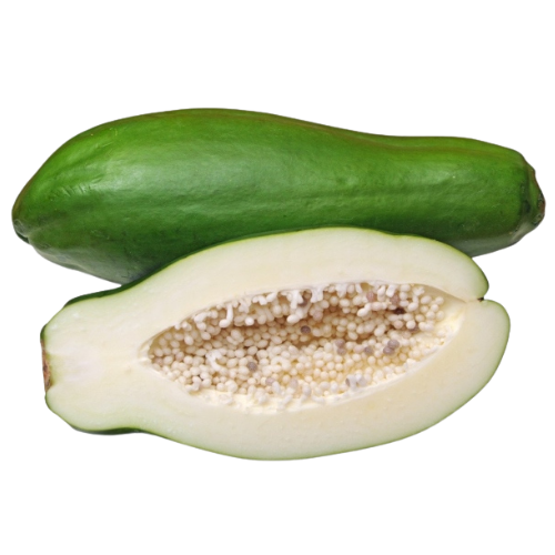 Whole and cut open green bitter melon on a white surface.