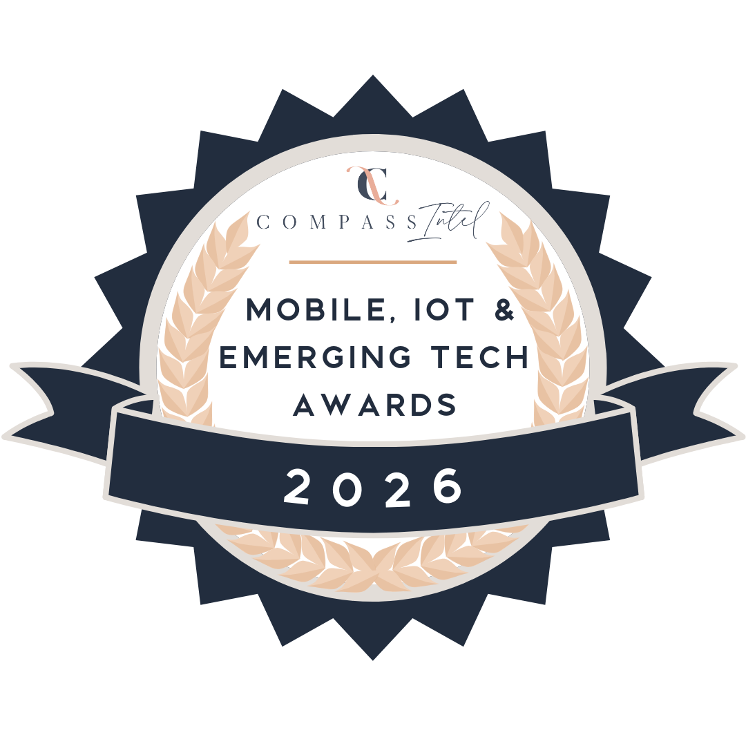 Badge for Compass Total Mobile, IoT & Emerging Tech Awards 2026, featuring a silver, navy, and beige color scheme with a laurel wreath design.