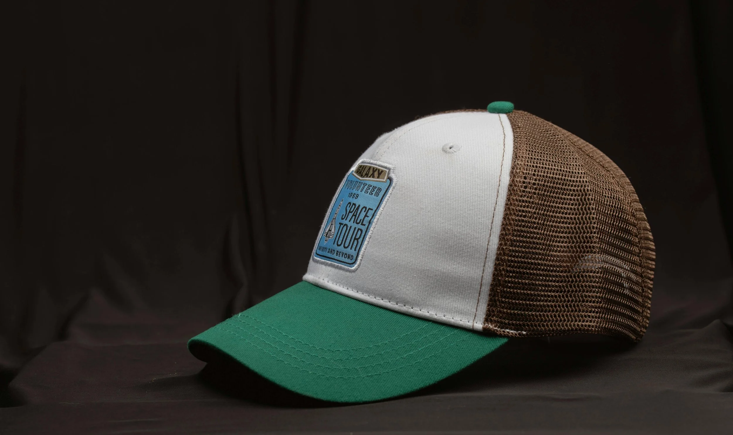 Custom trucker cap with embroidered front patch, produced for a private label hat brand.