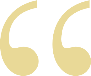 Two beige quotation marks on a black background