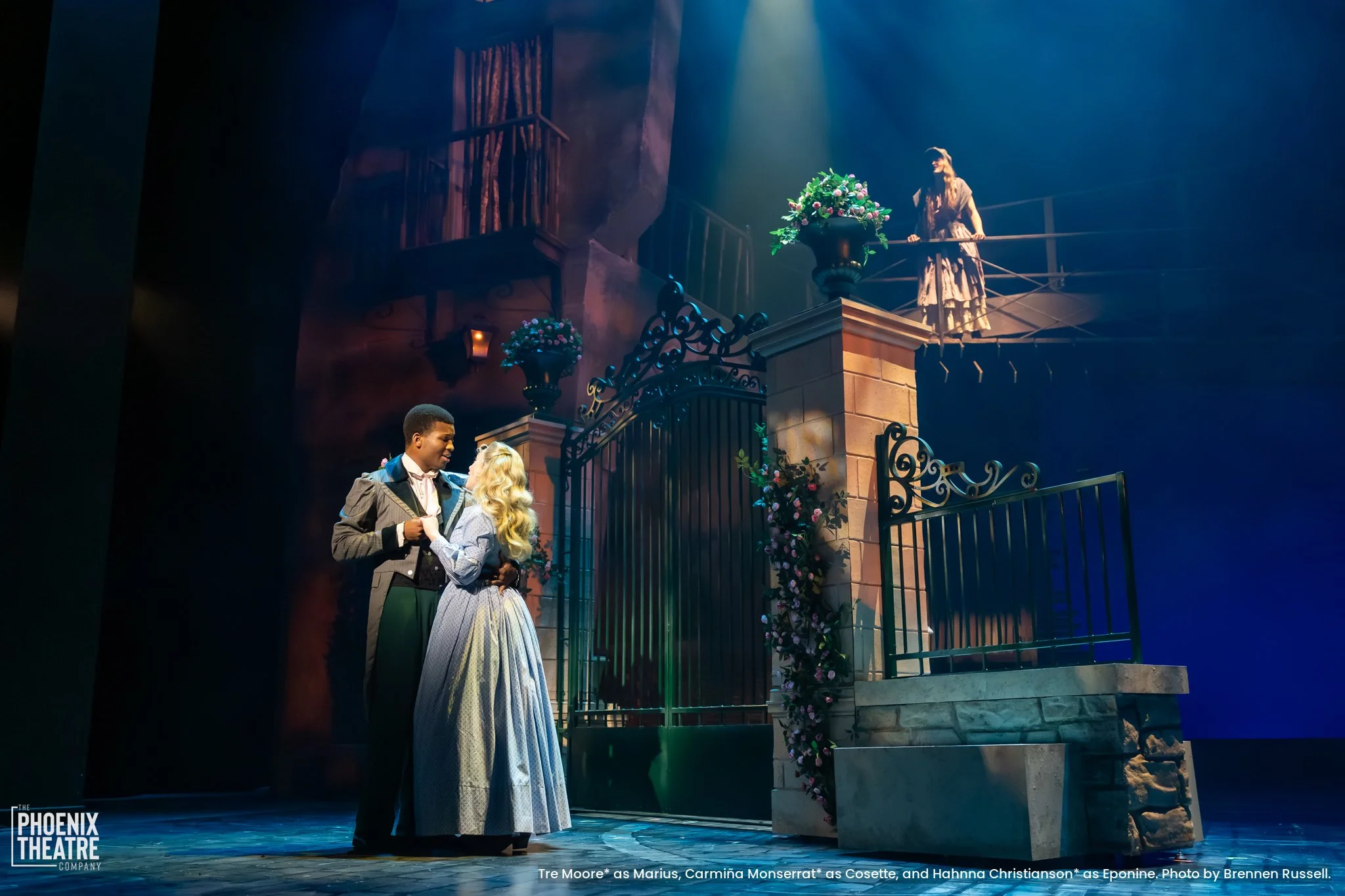 Tre Moore as Marius, Carmiña Monserrat as Cosette, and Hahnna Christianson as Eponine in "Les Misérables" at The Phoenix Theatre Company - Photo by Brennen Russell