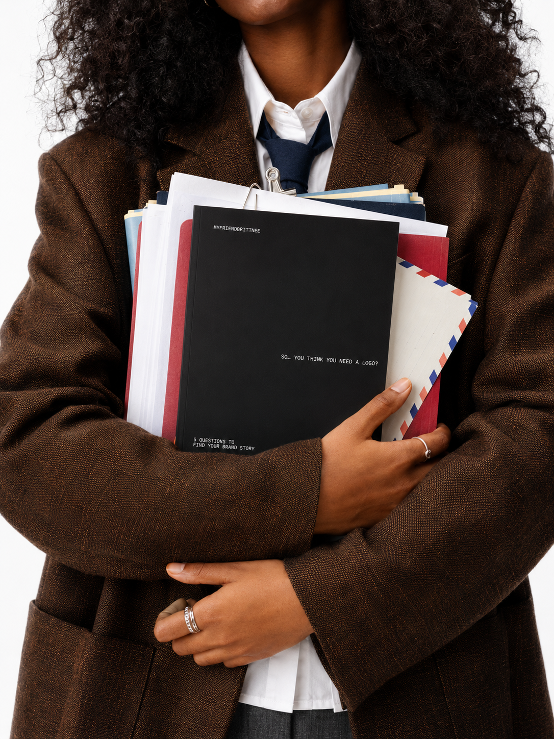 Girl holding workbook