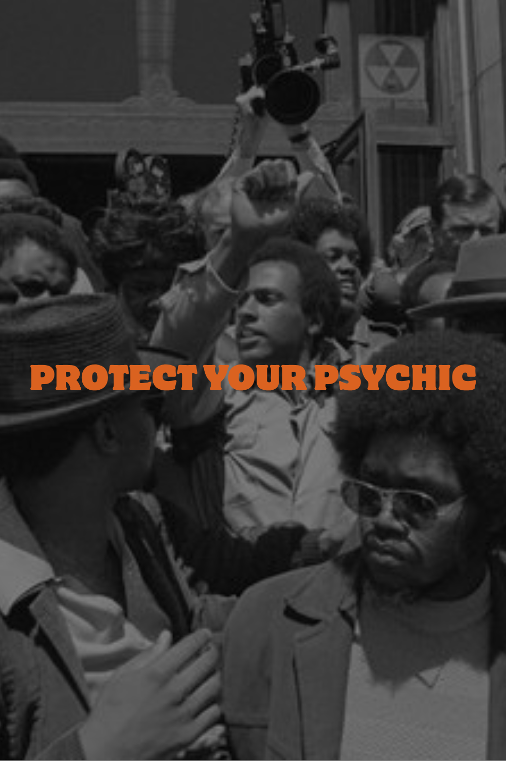 A black and white photo of a crowd of people protesting, with a person holding a camera high above their head. The image has orange text overlay that says 'PROTECT YOUR PSYCHIC'.