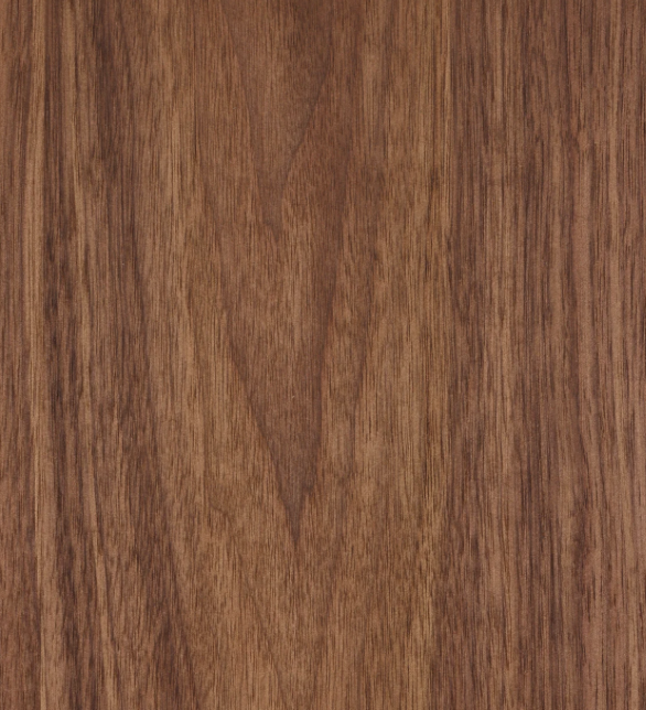 Close-up of a wooden surface with a visible wood grain pattern.