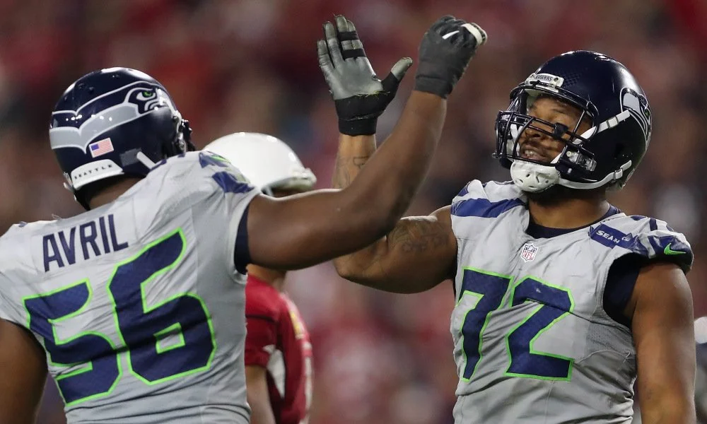 Cliff Avril, Michael Bennett and Marshawn Lynch give back in Haiti