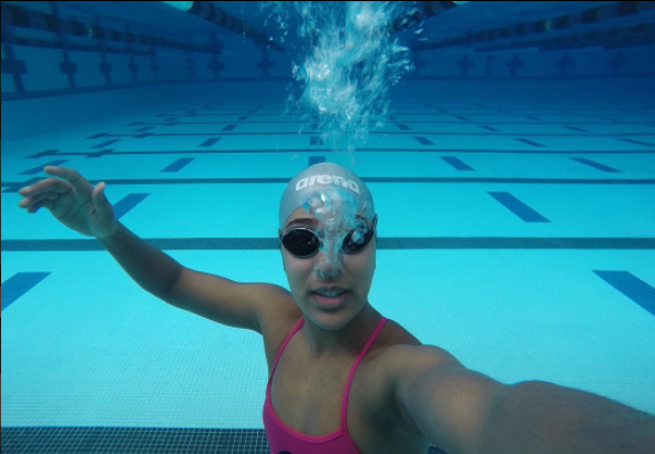 her sweat story: olympian naomy grand’pierre talks training &amp; swimming for haiti