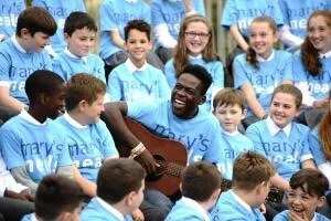 Haitian musician Jimmy Belabre tells Glasgow pupils how charity meals kept him from life of crime