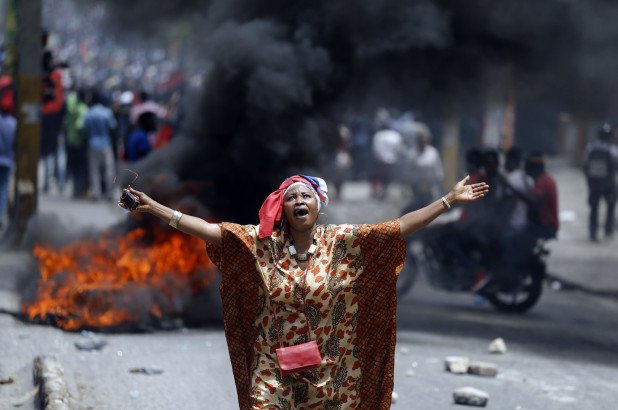 Two deaths as protesters burn tires, block roads in Haiti