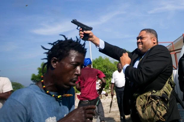 Haitian senator shoots two people, including journalist, outside parliament