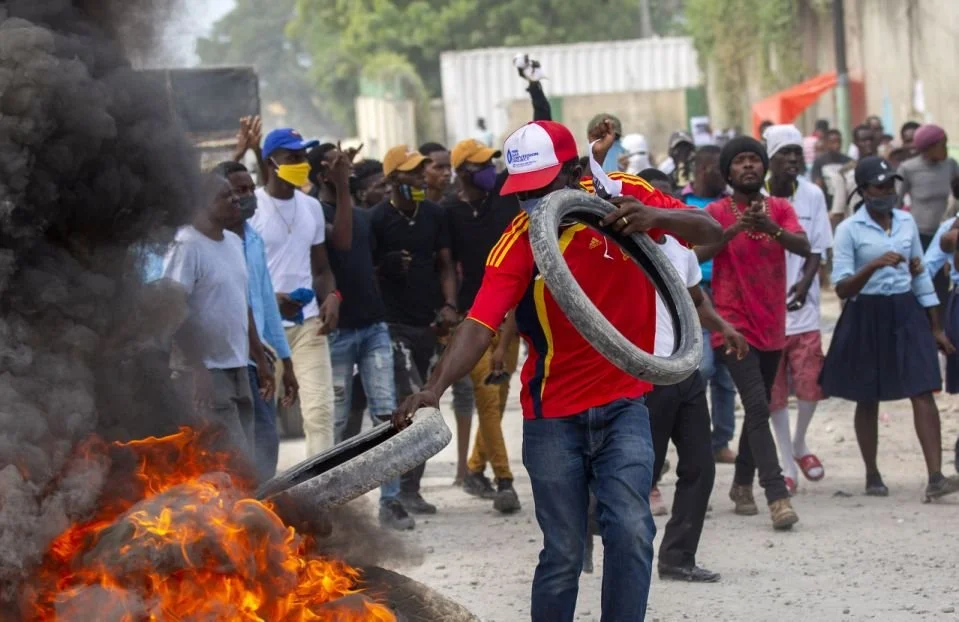 Hundreds march in Haiti after outrage over student's slaying