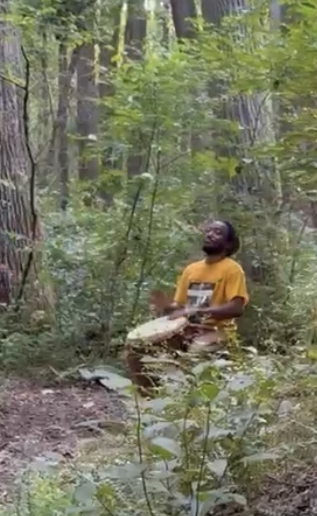  Musician Jabari Exum’s soulful djembe drumming near the stream.  