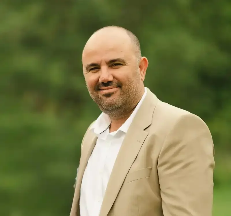 Rolfing testimonial picture of a man in a suit