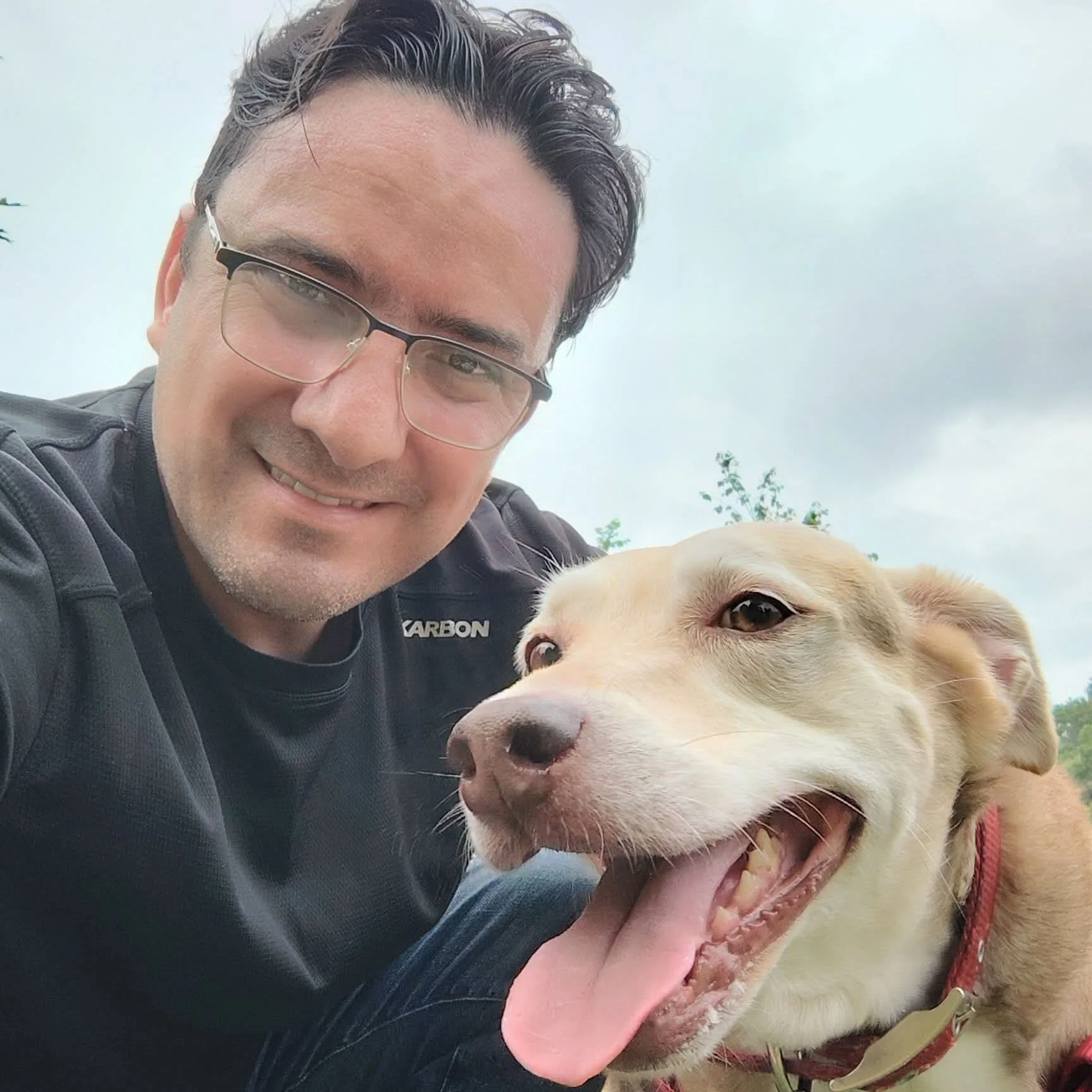 Augusto and Kira the dog, founders of Happy Dogs Happy Homes.