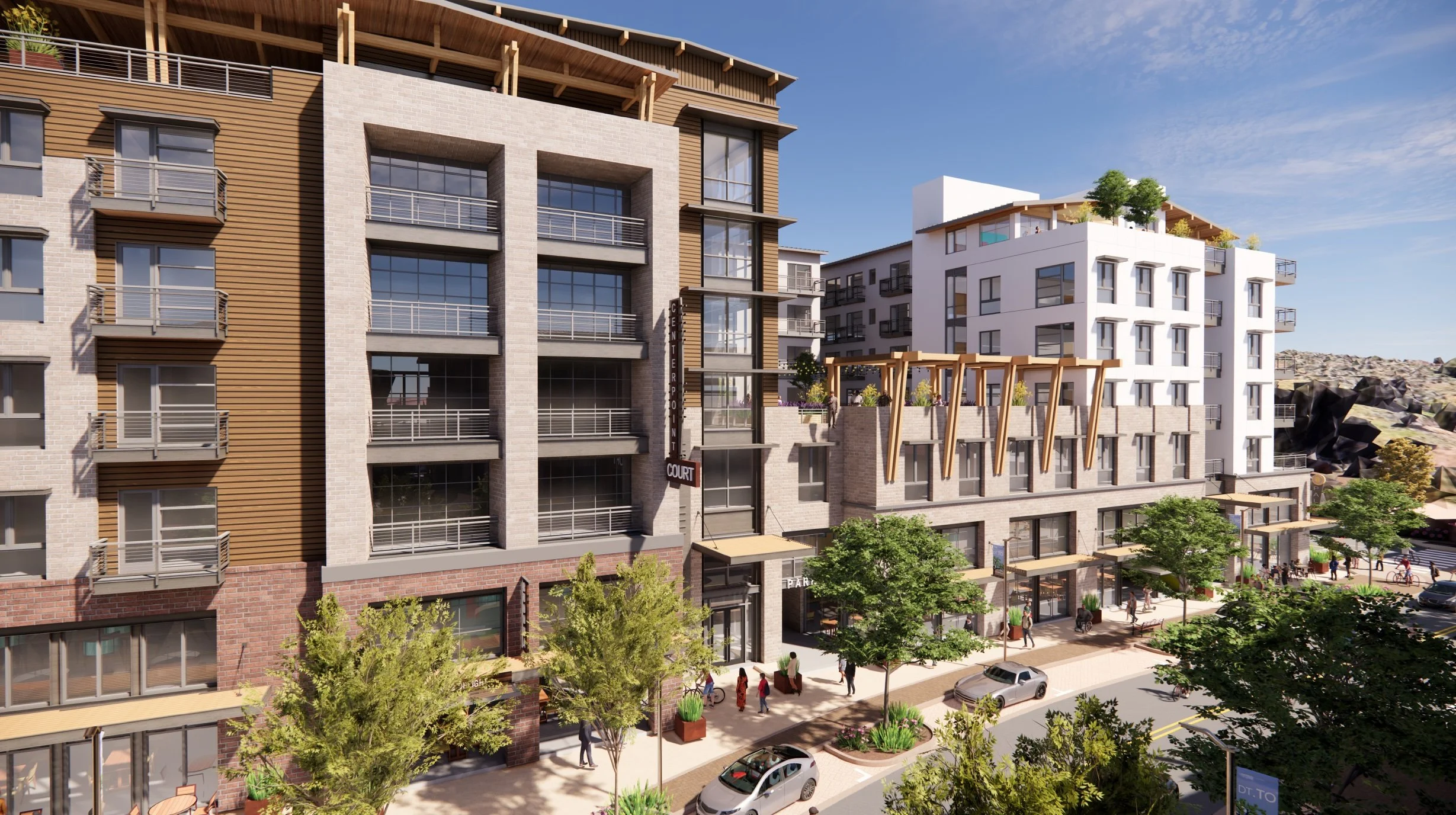 Housing and ground-floor businesses along "Main Street'' to the west