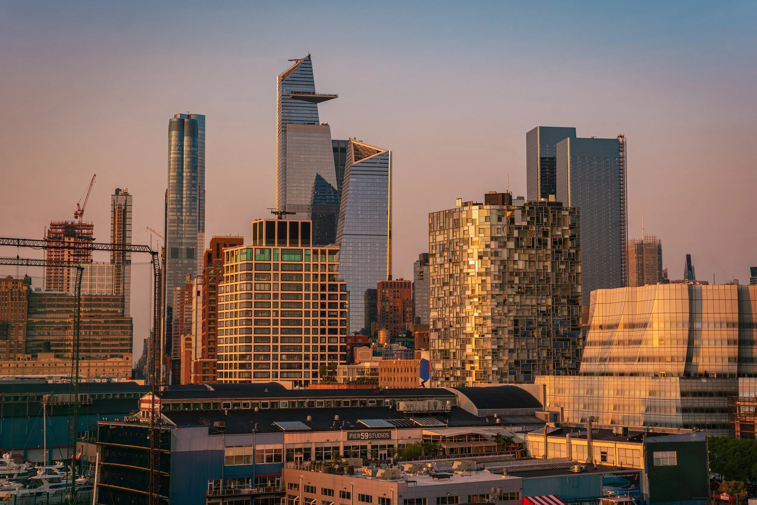 Various buildings in Midtown Manhattan as seen from the Pier 57 Rooftop Park. One of these buildings has The Edge NYC.