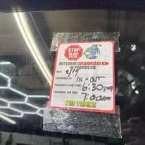 A sign related to interior deodorization service with details about appointment times