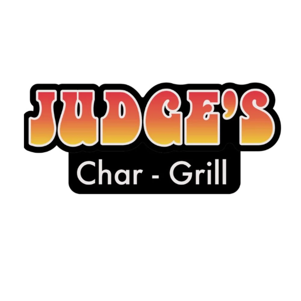 Logo for Judged's Char-B-Que Grill with text in bold, gradient red to yellow letters, and black outline on a white background