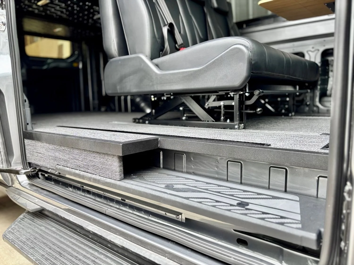conversion van subfloor installation with custom floor transitions