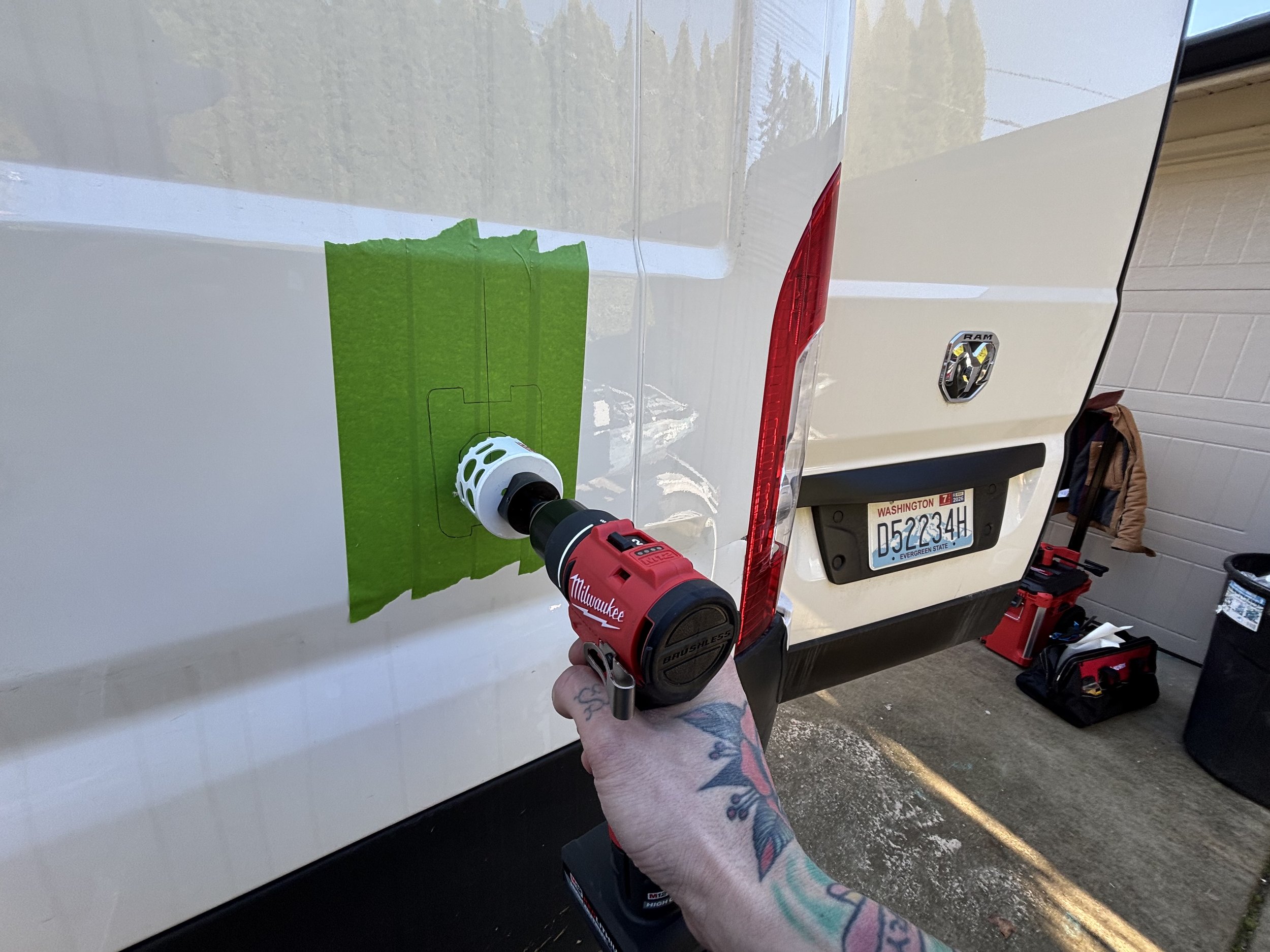 Installing a shore power inlet into a cargo van camper van conversion.