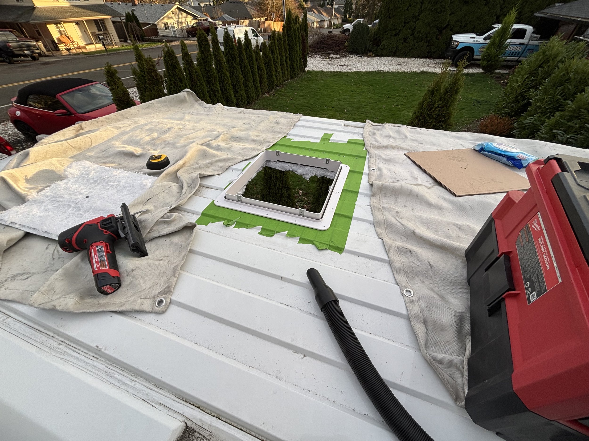 Installation of a maxx air fan in a camper van build out.