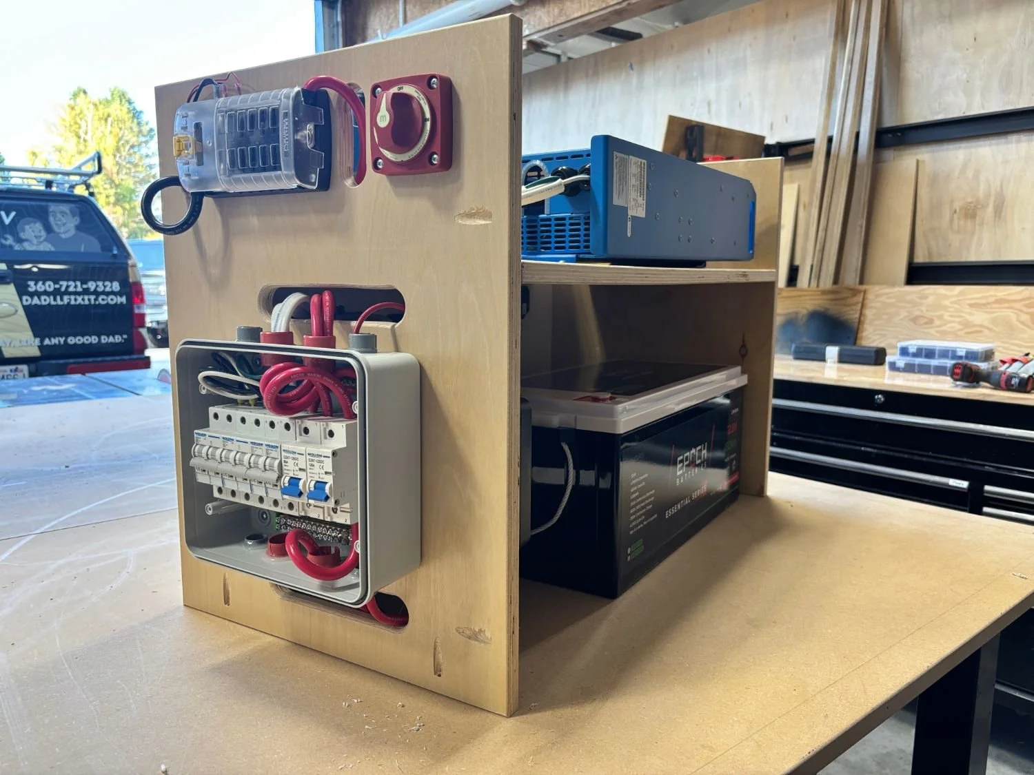 electrical board build for conversion van with victron 2000va inverter, epoch battery, blue sea and mini dc breaker box