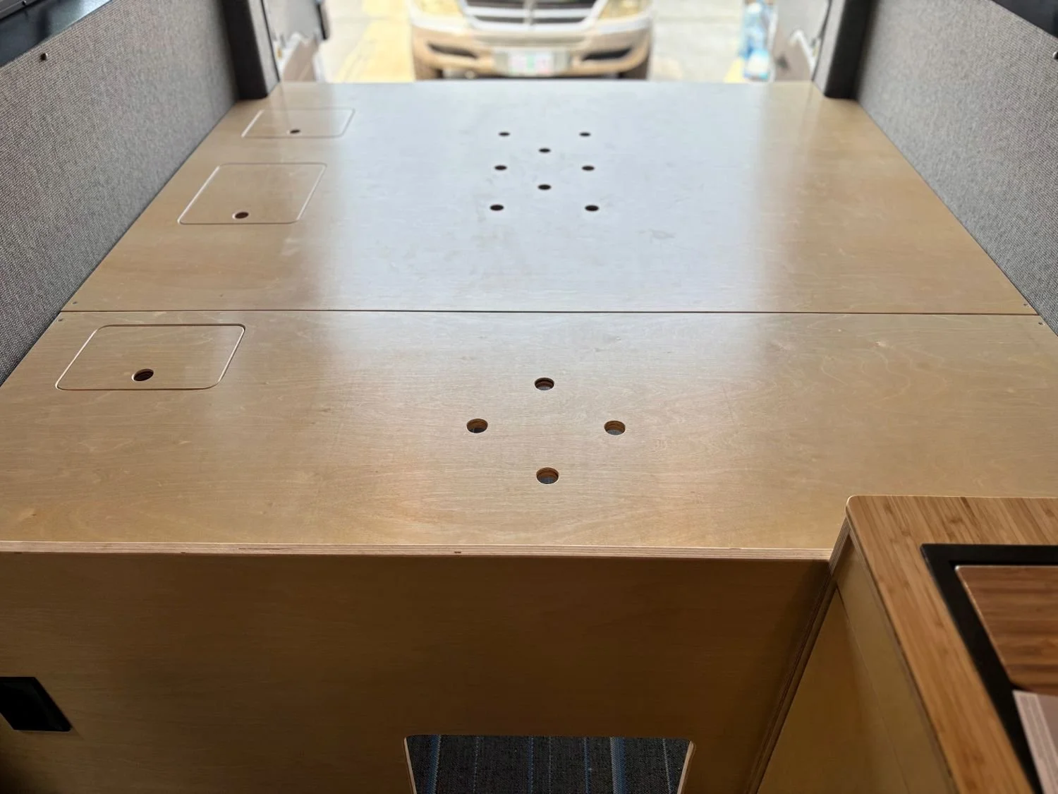 custom bed platform for camper van conversion