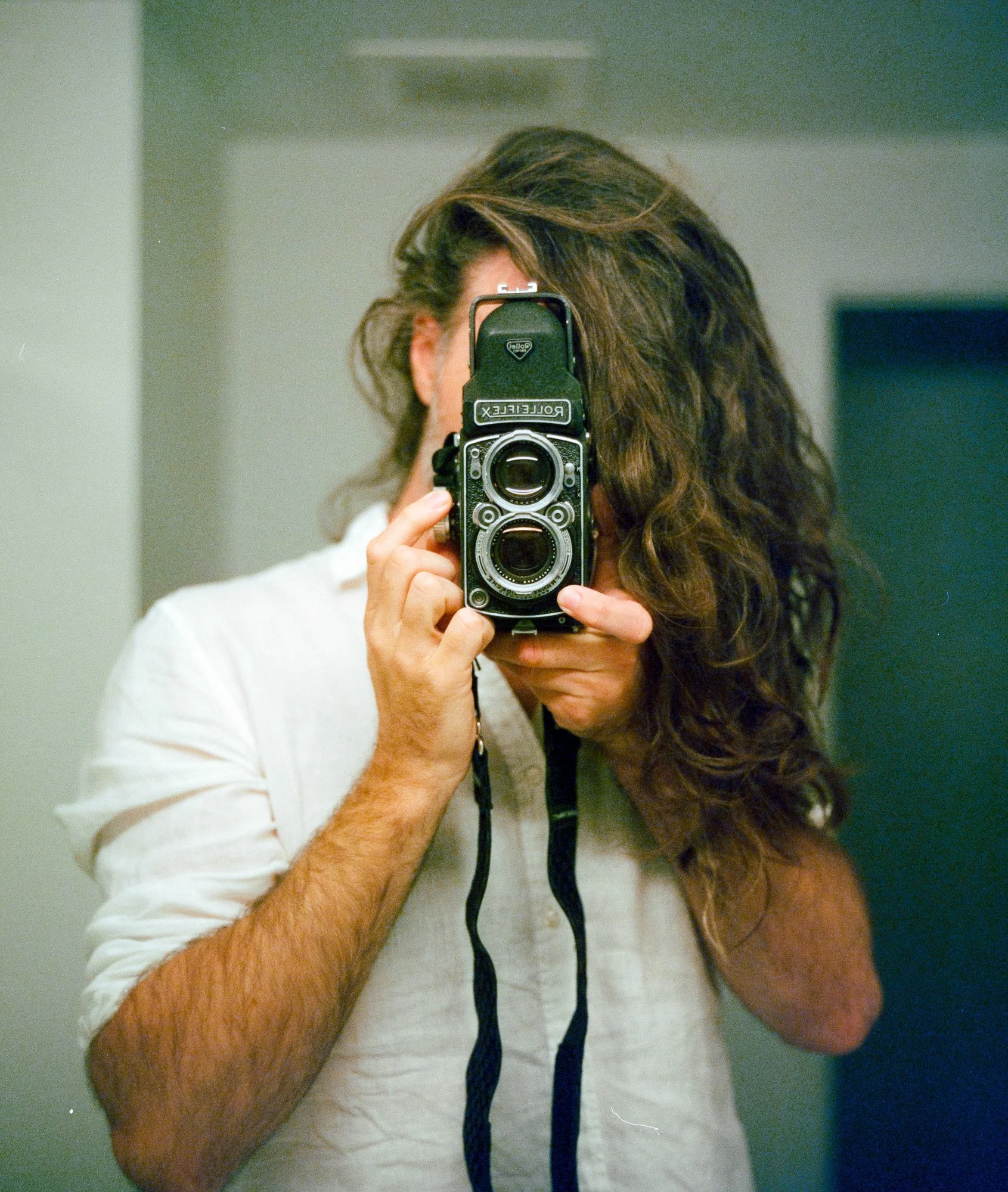 Self Portrait. 
Miami, USA  '24
Camera: Rolleiflex 2.8 Xenotar
Film: Cinestill 400D