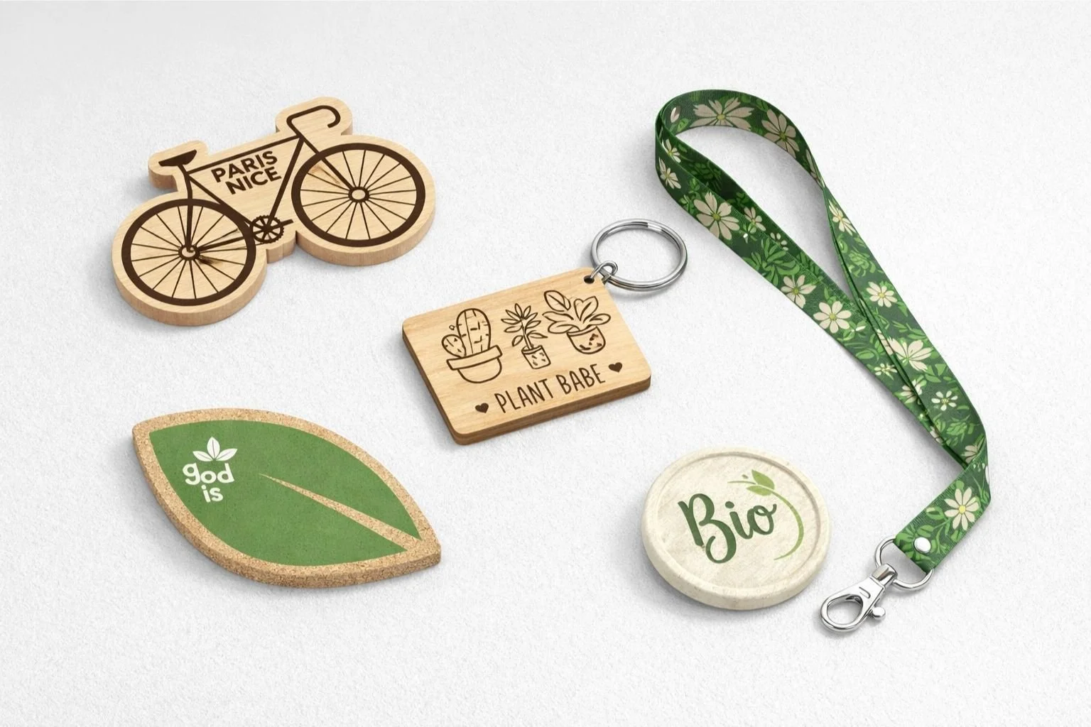 Goodies écoresponsables : matériaux recyclés/biosourcés et options de traçabilité (badge, médaille bois, tour de cou).