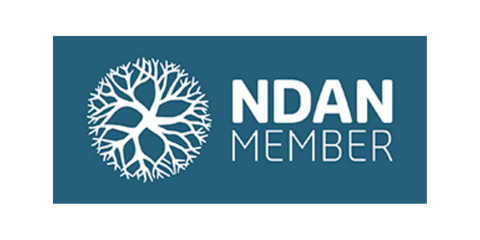 NDAN Member logo with a white tree emblem on a blue background.