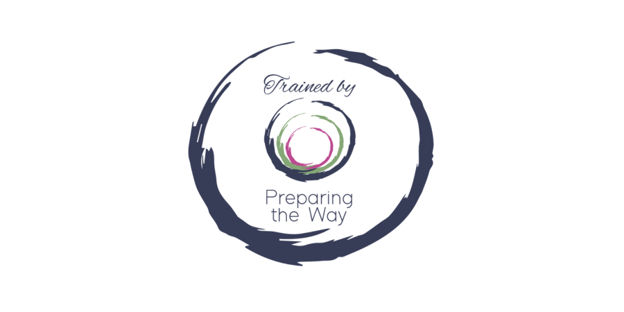 A circular logo with colourful concentric circles and the text 'Trained By Preparing the Way' written inside.