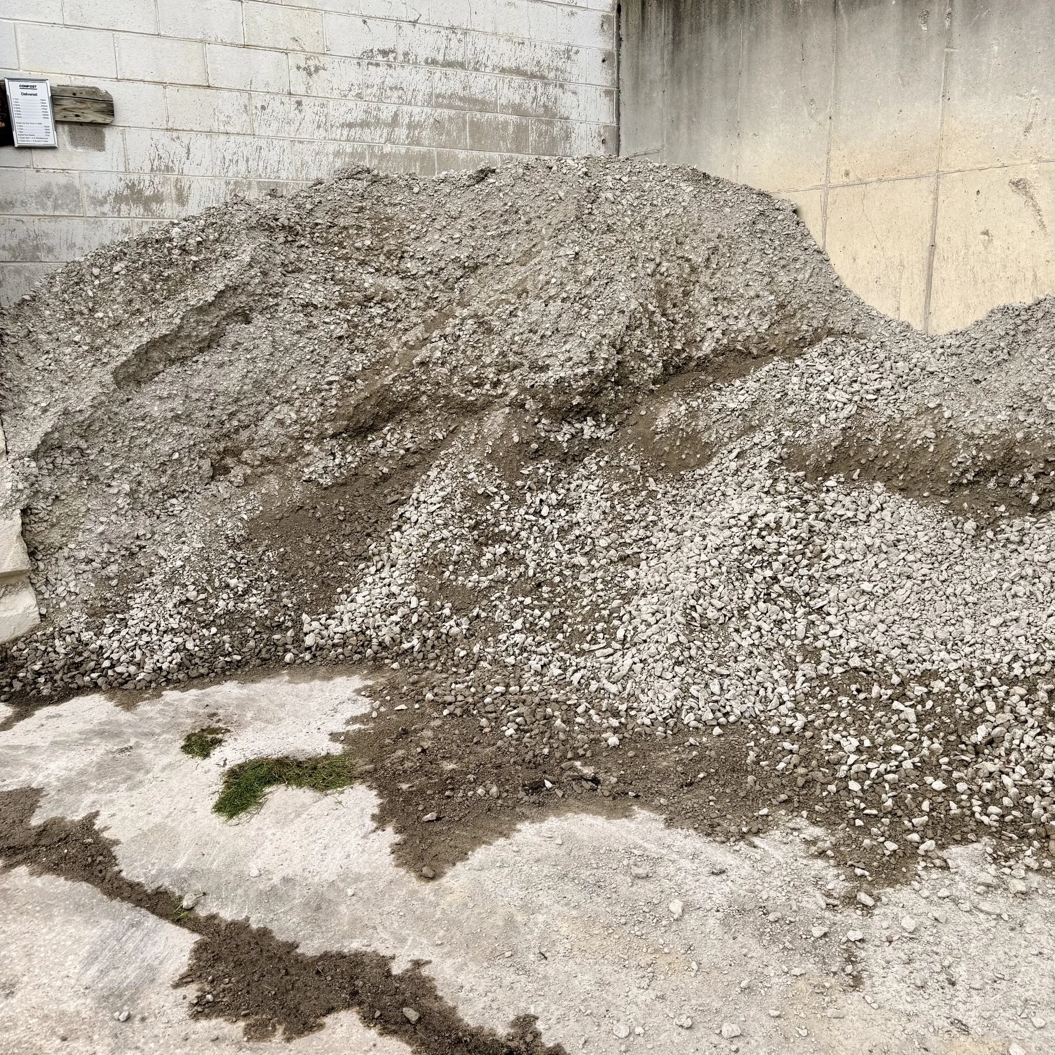 A pile of21AA crushed stone at Allemon’s Landscape Center, Detroit, Michigan serving the Grosse Pointe, St. Clair Shores, and Detroit Communities since 1929.
