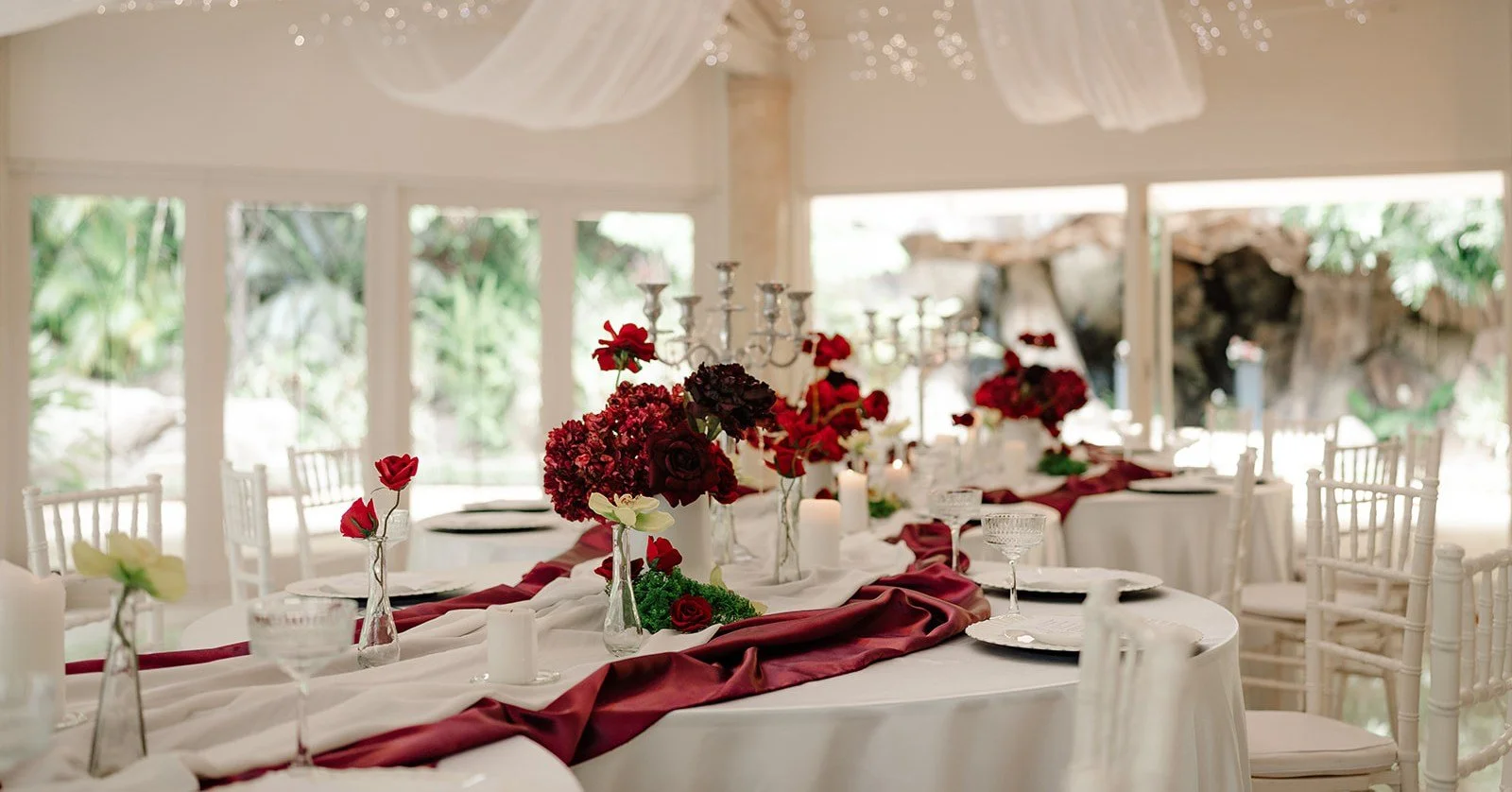 We&rsquo;ve been having so much fun exploring new styling directions for our Waterfall Pavilion as we look ahead to our 2026 and 2027 weddings.

This serpentine table setup, styled with deep Pantone tones and rich cherry red details, is a beautiful e