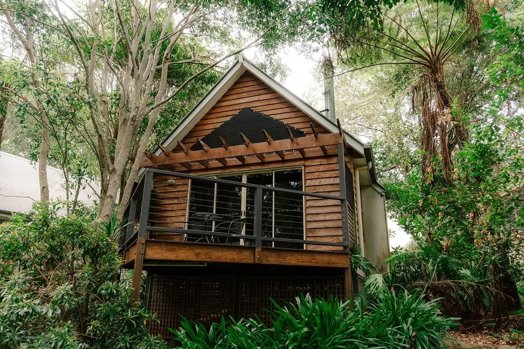 Our on-site cottages are made for slow weekends away.
Set across five acres, each space is designed for cosy mornings, quiet evenings, and everything in between.

Fireplace, spa bath, private balcony&hellip; and just a short walk to local cafes and w